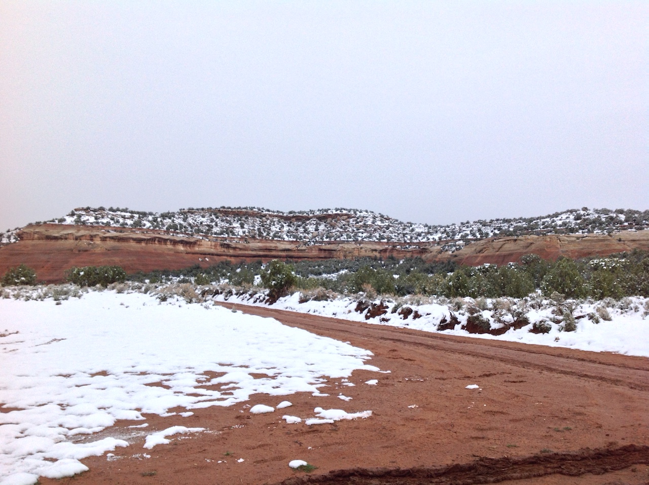 mcinnis-canyons-sign-snow-winter-backpacking-camping-morning-6